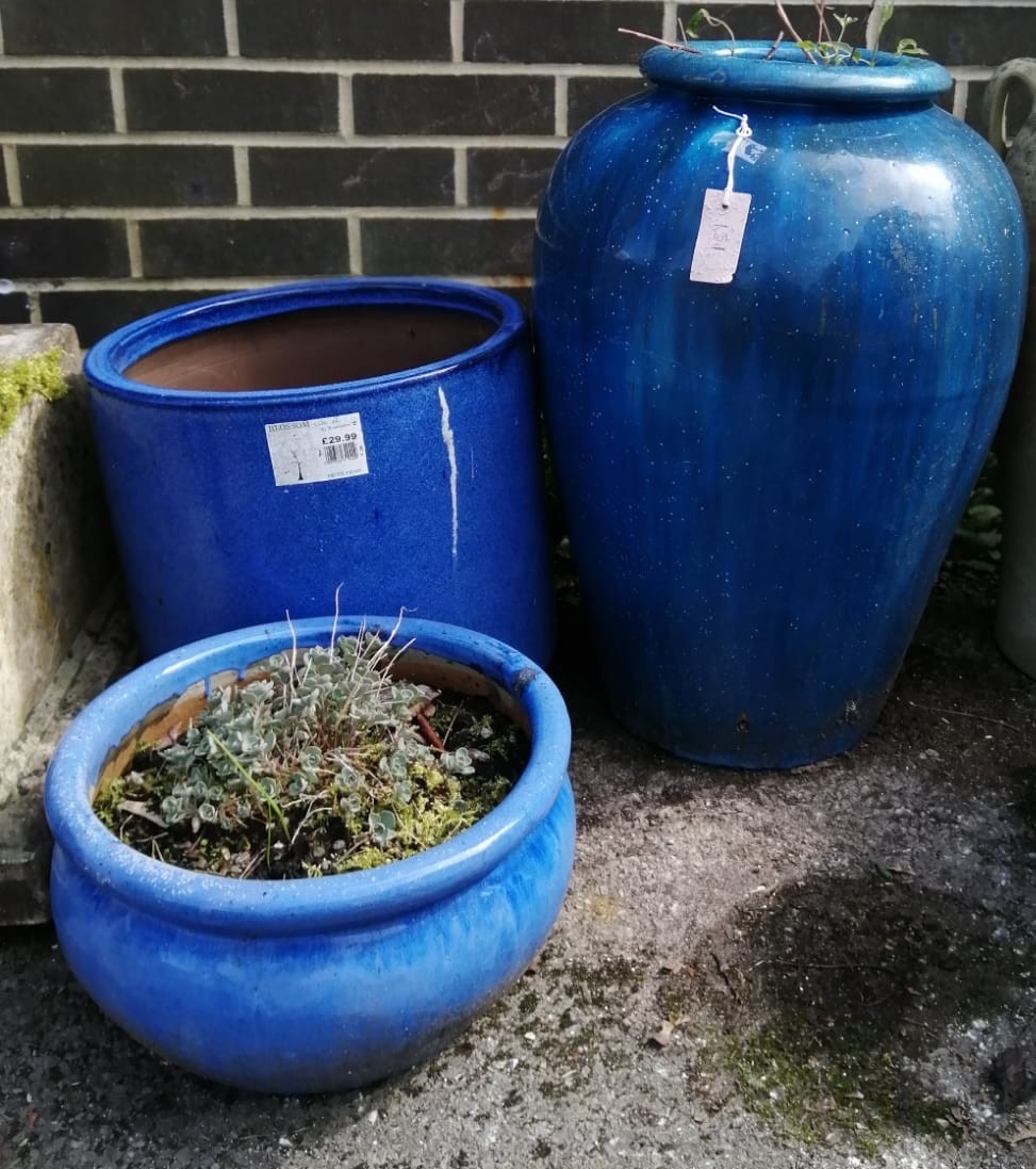 Three blue glazed earthenware garden planters, largest height 62cm *Please note the sale commences at 9am.